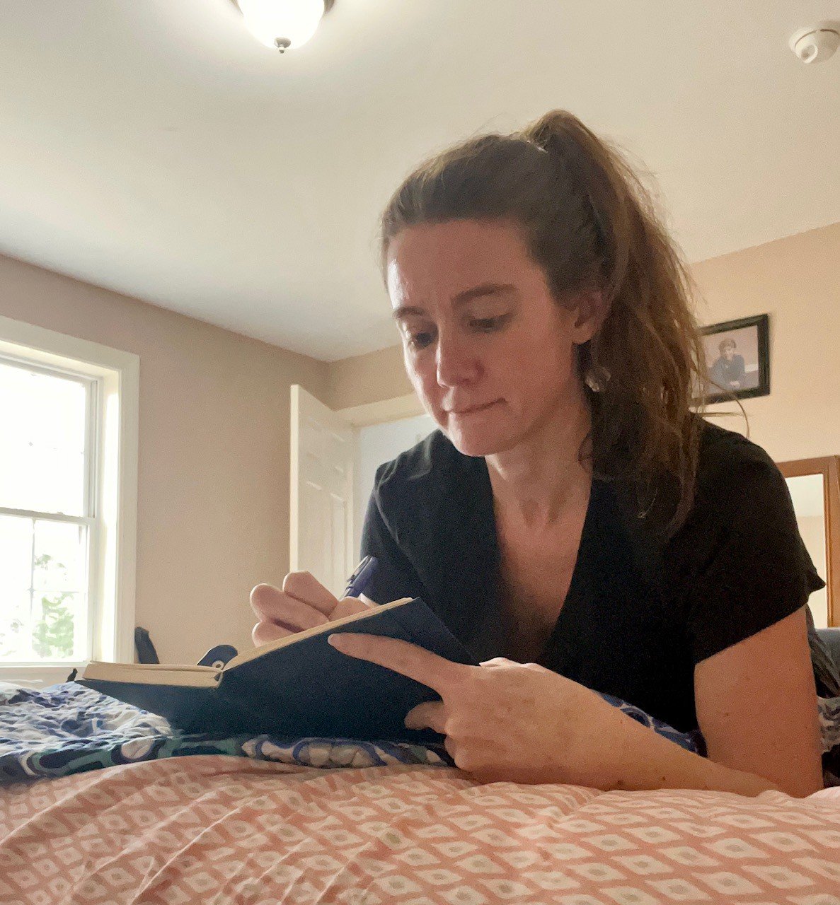 Me writing in a journal.